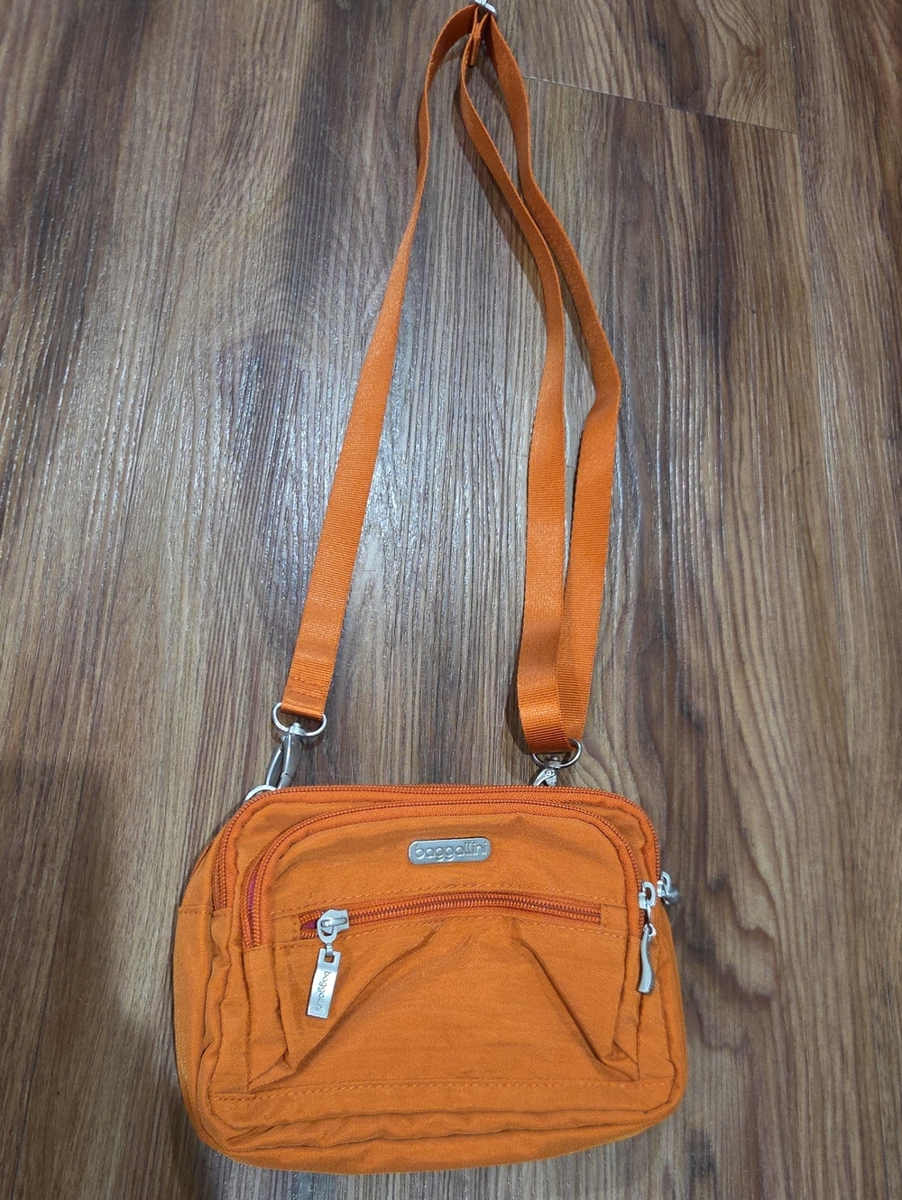Baggallini Orange Compact Crossbody with Multiple Zip Pockets